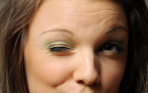 What causes eyes to twitch and what does it mean in different cultures?